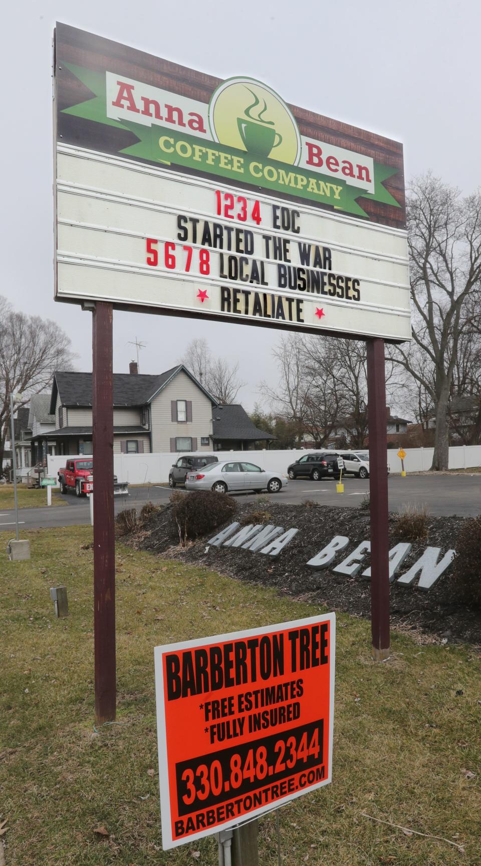 The Anna Bean Coffee Company displays a cheeky message Monday taking credit for stirring up the sign wars in Barberton.