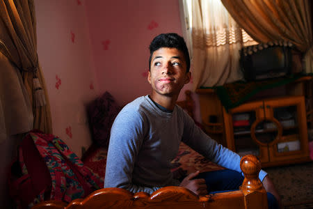 Moatasem Al-Nabeeh, 14, who is diagnosed with cancer, poses during an interview with Reuters at his home in Gaza City, February 12, 2019. REUTERS/Dylan Martinez