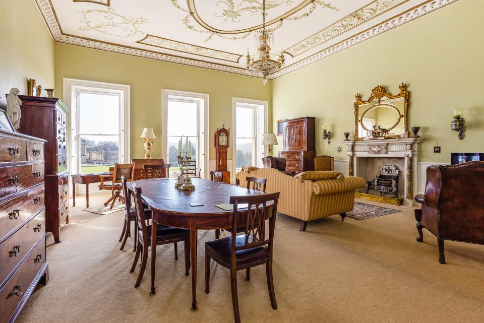 The interiors have all the trappings of a regency-era home.