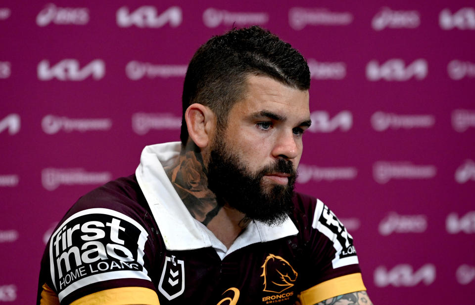 Adam Reynolds (pictured) looks dejected after the Broncos' 60-12 loss to the Storm.