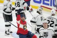 Florida Panthers left wing Ryan Lomberg, center foreground, celebrates after scoring during the second period of an NHL hockey game against the Los Angeles Kings, Friday, Jan. 27, 2023, in Sunrise, Fla. (AP Photo/Wilfredo Lee)