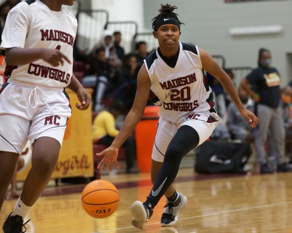 Madison County sophomore Ja'merial Weatherspoon (20) takes the ball down court in a game against FAMU DRS on Jan. 22, 2022, at Madison County High School. The Rattlers won 58-31.