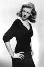 <p>Lauren Bacall dresses up her v-neck LBD with a four-strand pearl choker—and, of course, her killer stare. </p>