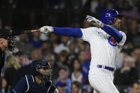 Chicago Cubs' Mike Tauchman watches his RBI single during the sixth inning of a baseball game against the Tampa Bay Rays Tuesday, May 30, 2023, in Chicago. (AP Photo/Paul Beaty)