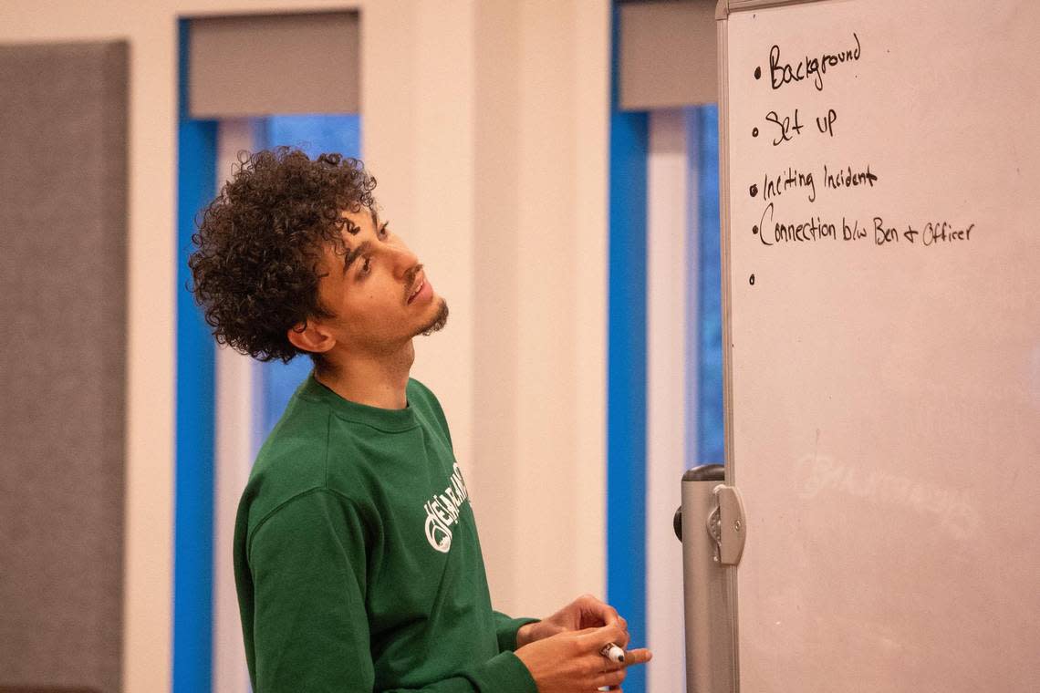 Logan Stacer, artistic director of Heartland Arts KC, a non-profit theater organization he found, uses theatrical performance to advocate for social justice. He recently lead a group of actors in a discussion in preparation for a performance about gun violence in Kansas City.