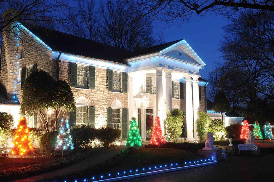 <p>Elvis Presley Enterprises, Inc</p> Graceland estate at Christmas