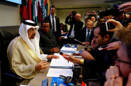FILE PHOTO: OPEC President, Saudi Arabia's Energy Minister Khalid al-Falih, and OPEC Secretary General Mohammad Barkindo talk to journalists before the beginning of a meeting of the Organization of the Petroleum Exporting Countries (OPEC) in Vienna, Austria, May 25, 2017. REUTERS/Leonhard Foeger/File Photo