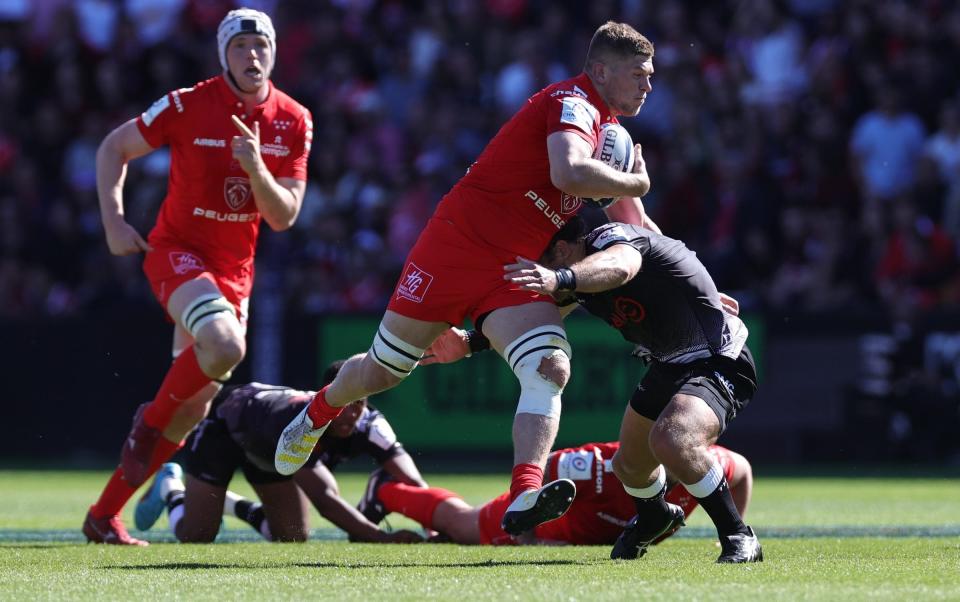Jack Willis of Toulouse is held by during Werner Kok during the Heineken Champions Cup match between Toulouse and Sharks at Stade Ernest Wallon - David Rogers/Getty Images