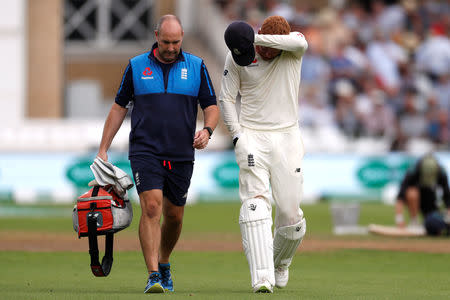 Cricket - England v India - Third Test - Trent Bridge, Nottingham, Britain - August 20, 2018 England's Jonny Bairstow leaves the field after sustaining an injury Action Images via Reuters/Paul Childs