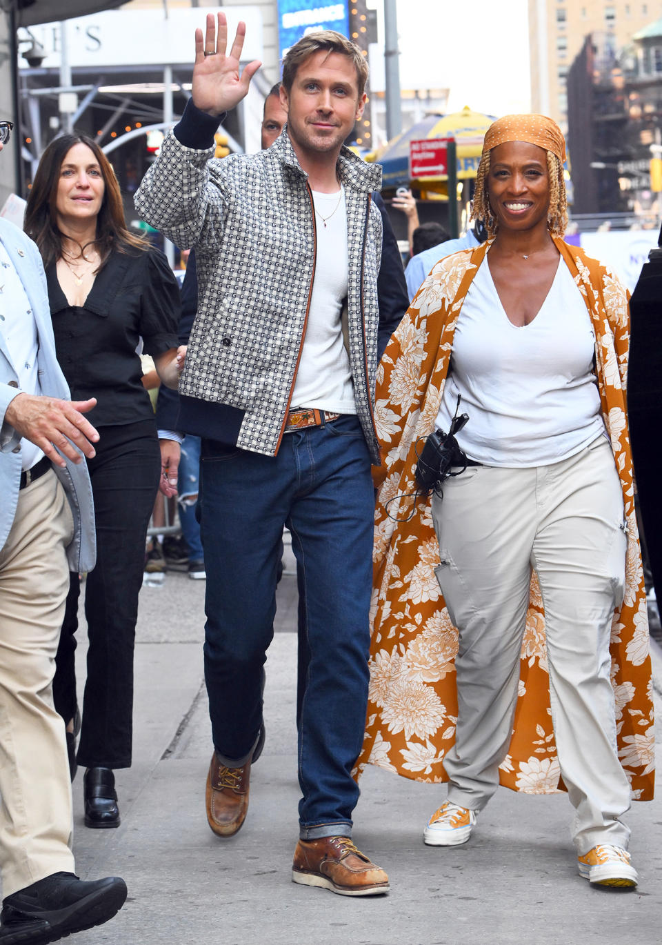 <p>Ryan Gosling waves to the cameras outside of <em>Good Morning America </em>in N.Y.C. on July 21. </p>