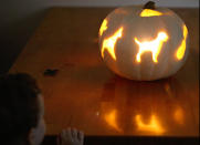 <body> <p>With a mallet and a few cookie cutters, you can customize a whimsical pumpkin this year. Begin by slicing off the top of your <a rel="nofollow noopener" href=" http://www.bobvila.com/articles/gourd-crafts/?#.V-MR4JMrIcg?bv=yahoo" target="_blank" data-ylk="slk:gourd;elm:context_link;itc:0;sec:content-canvas" class="link ">gourd</a> and removing the pulp, then rummage through your kitchen drawers to find a few interesting cookie cutters. Don’t limit yourself to traditional Halloween designs—you can also stamp letters, animals, and other fun shapes into your pumpkin! Place the cookie cutters onto the pumpkin’s exterior, and use a mallet to press each one into the skin. Carve along the outlines of the shapes with a knife or carving tool, pop in a candle, and enjoy your festively fun decoration!</p> <p><strong>Related: <a rel="nofollow noopener" href=" http://www.bobvila.com/articles/genius-pumpkin-carving-ideas-for-kids/?#.V-MDf5MrIcg?bv=yahoo" target="_blank" data-ylk="slk:Genius! The Easy-as-Pie Way to Carve a Pumpkin;elm:context_link;itc:0;sec:content-canvas" class="link ">Genius! The Easy-as-Pie Way to Carve a Pumpkin</a> </strong> </p> </body>