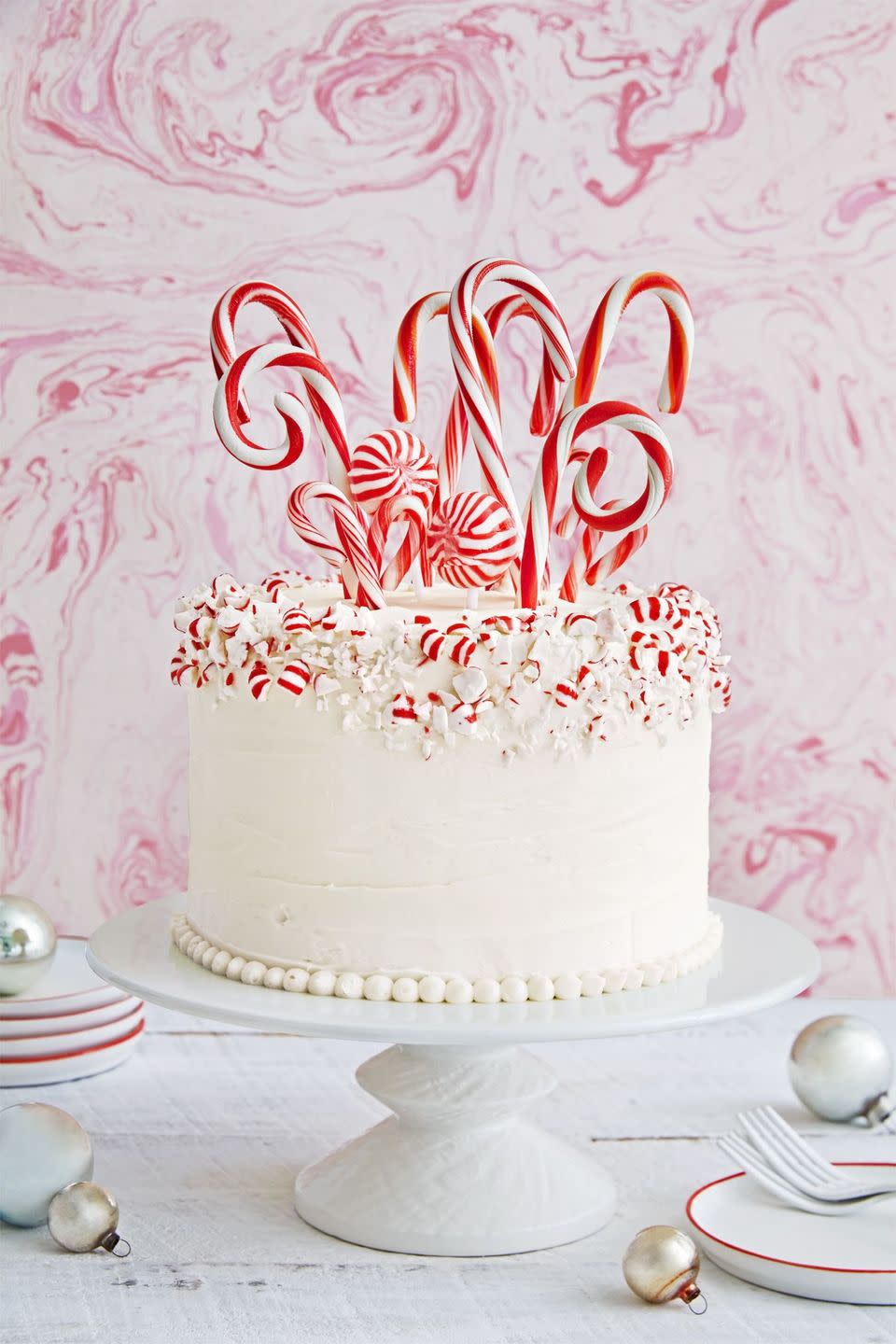 <p>Twirl up a white cake covered with crushed peppermints and candy canes.</p><p><strong><a href="https://www.countryliving.com/food-drinks/recipes/a40480/candy-cane-forest-cake-recipe/" rel="nofollow noopener" target="_blank" data-ylk="slk:Get the recipe for Candy Cane Forest Cake;elm:context_link;itc:0;sec:content-canvas" class="link ">Get the recipe for Candy Cane Forest Cake</a>.</strong></p>