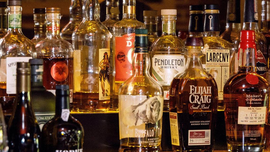 Bottles of liquor varieties line the shelf behind the bar at Red Feather Lounge on North Eighth Street in downtown Boise.