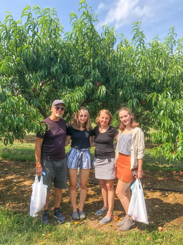 Woroniecka with her husband, Dr. Robert Woroniecka, and their two daughters. Family Photo