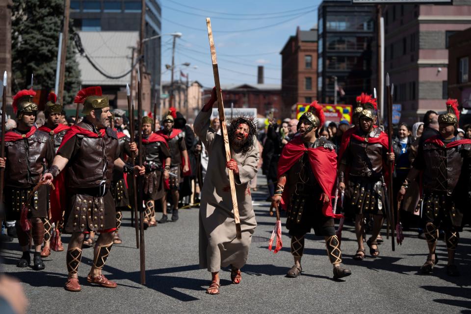 Mar 29, 2024; Paterson, NJ, USA; The Stations of the Cross journey on Grand Street in Paterson as part of a dramatic reenactment of the Passion of Christ presented by the Cathedral of St. John the Baptist in Paterson.