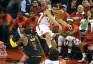 May 21, 2016; Toronto, Ontario, CAN; Toronto Raptors guard Cory Joseph (6) jumps to make a pass over Cleveland Cavaliers guard Kyrie Irving (2) in game three of the Eastern conference finals of the NBA Playoffs at Air Canada Centre. Mandatory Credit: Dan Hamilton-USA TODAY Sports