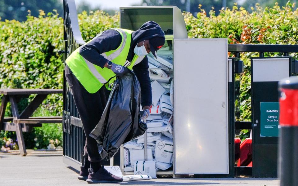 An overflowing Randox drop-off box in August 2021 - SWNS/Tristan Potter