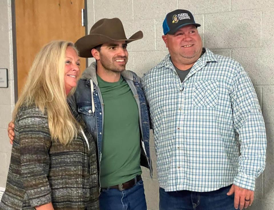 Country music artist Mitch Rossell poses for a photo with fans following his November concert at Canton South High School. Rossell returns to the school for a May 13 show.