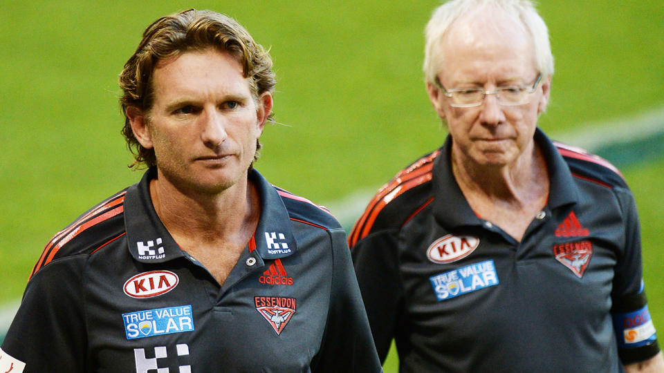 James Hird and Bruce Reid, pictured here during an Essendon game in 2013. 