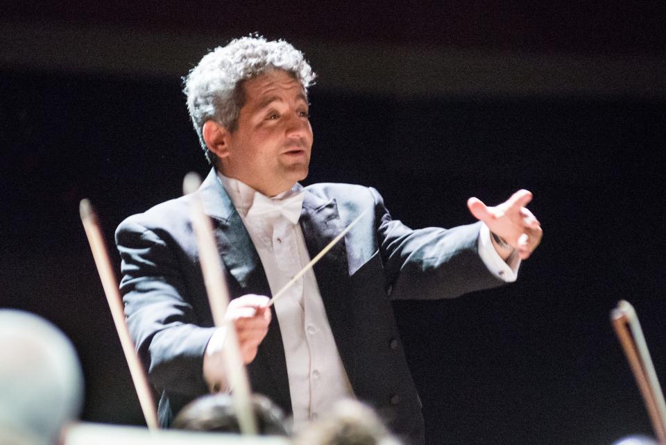Maestro Julien Benichou directs the Mid-Atlantic Symphony Orchestra.