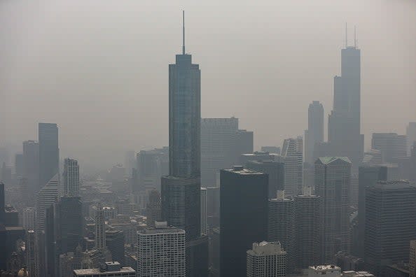 Chicago’s skyline is seen from the 360 Chicago Observation Deck of the John Hancock Building with heavy smoke from the Canadian wildfires blanketing the city, on June 27, 2023 (AFP via Getty Images)