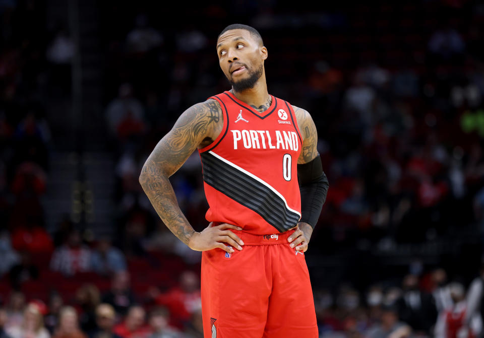 HOUSTON, TEXAS - NOVEMBER 12: Damian Lillard #0 of the Portland Trail Blazers reacts in the first half against the Houston Rockets at Toyota Center on November 12, 2021 in Houston, Texas.  NOTE TO USER: User expressly acknowledges and agrees that, by downloading and or using this photograph, User is consenting to the terms and conditions of the Getty Images License Agreement.   (Photo by Tim Warner/Getty Images)