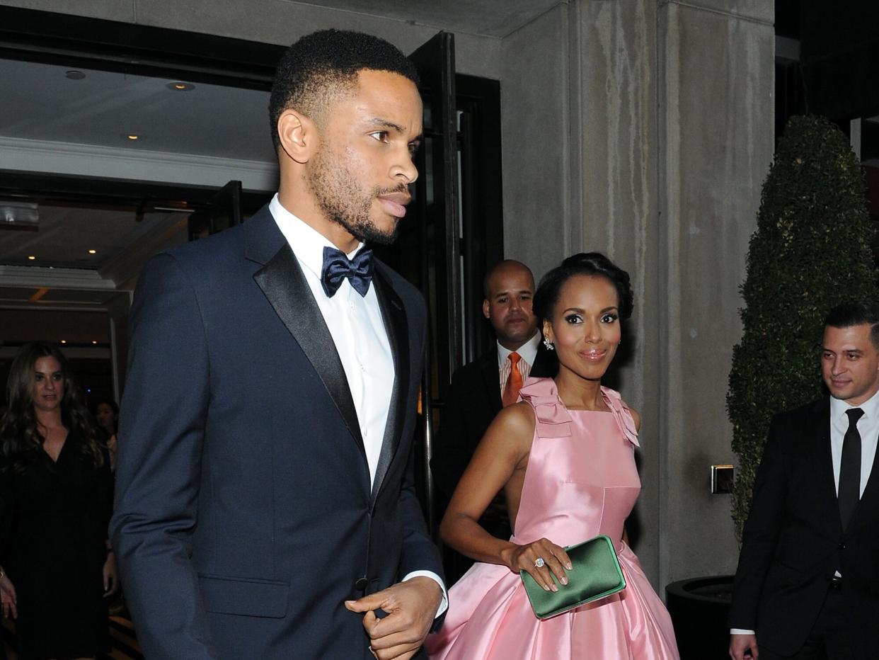 Kerry Washington (R) and Nnamdi Asomugha depart The Mark Hotel for the Met Gala at the Metropolitan Museum of Art on May 4, 2015 in New York City