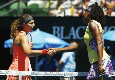 Tennis - Australian Open - Melbourne Park, Melbourne, Australia - 18/1/17 Venus Williams of the U.S. shakes hands after winning her Women's singles second round match against Switzerland's Stefanie Voegele. REUTERS/Thomas Peter