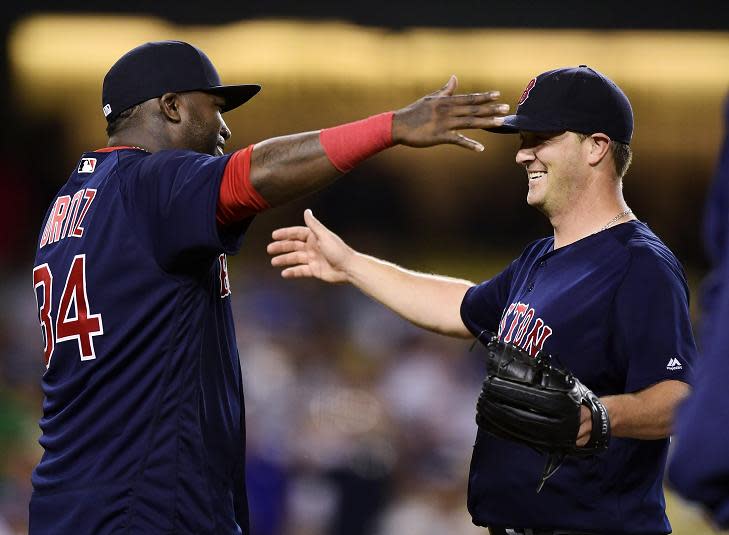 David Ortiz (left) congratulates starting pitcher Steven Wright after shutting out the Dodgers in Los Angeles. (AP)