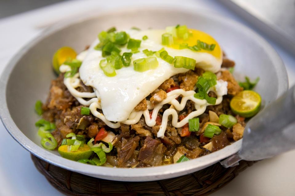 Sisig is one of the Filipino dishes served at Eat Sarap, a Filipino restaurant, located inside Flamingo Island Flea Market in Bonita Springs.