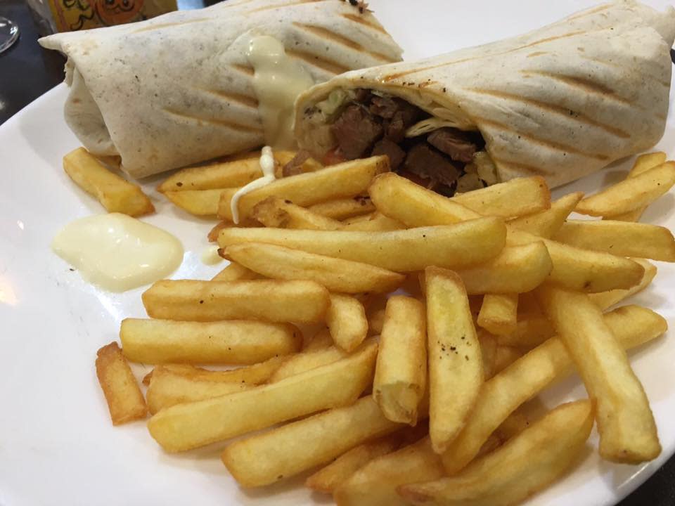 Probably our 8th time eating shawarma in as many days but the beef being grilled looked too good to pass up, especially in the cold February spring time at night! Shawarma and fries, with drink, €16. (Photo: Zurien Onn)
