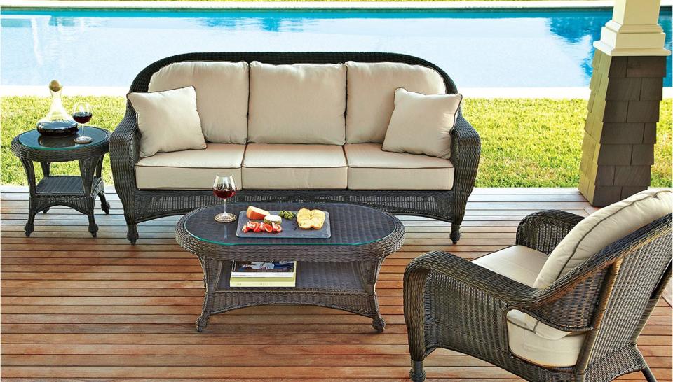 Lounge by your pool on this comfy outdoor sofa.