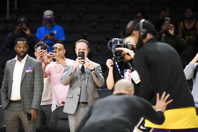 LOS ANGELES, CA - APRIL 28: People watch and record on their phones as Los Angeles Lakers forward LeBron James (6) warms up before the game against the Oklahoma City Thunder at Crypto.com Arena on Thursday, April 28, 2016 in Los Angeles, CA.(Wally Skalij / Los Angeles Times)