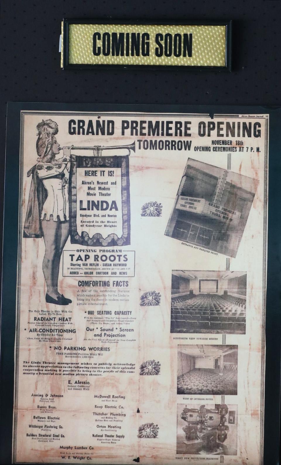 An advertisement from the Akron Beacon Journal about the original grand opening of the Linda Theater is seen in the lobby of the Goodyear Heights movie house in Akron.