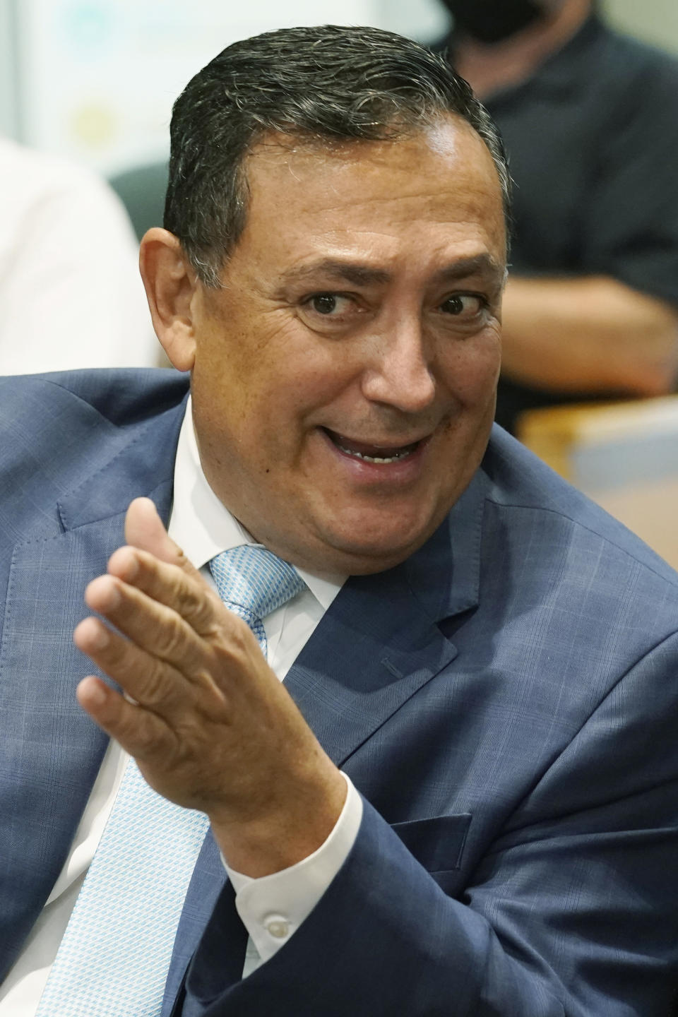 Miami police Chief Art Acevedo gestures before a hearing at Miami City Hall to determine his job, Thursday, Oct. 14, 2021, in Miami. Acevedo was suspended after a tumultuous six-month tenure. (AP Photo/Marta Lavandier)