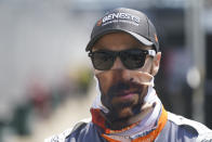 James Hinchcliffe, of Canada, walks down pit lane during qualifications for the Indianapolis 500 auto race at Indianapolis Motor Speedway, Saturday, Aug. 15, 2020, in Indianapolis. (AP Photo/Darron Cummings)