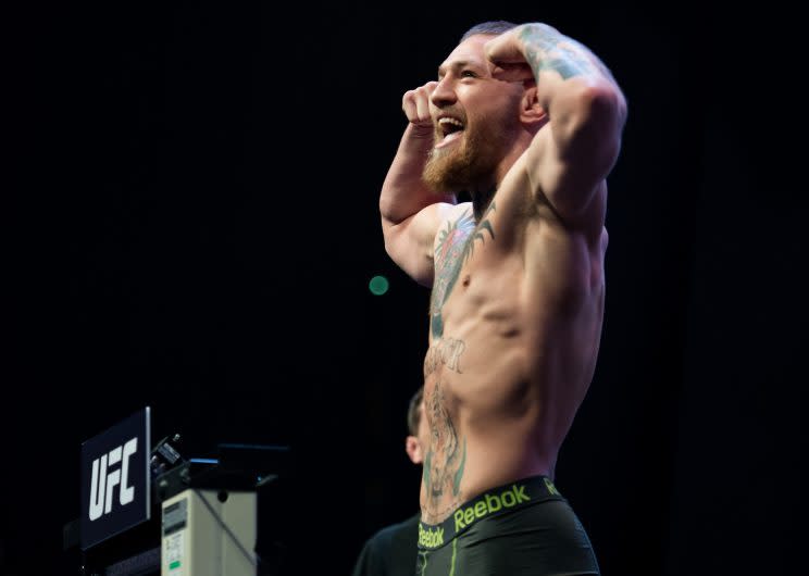 Conor McGregor plays to the crowd during the UFC 196 weigh-in on March 4, 2016 in Las Vegas, Nevada. (Getty Images)