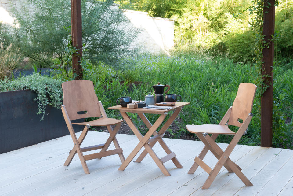 deck area in backyard by Eden Garden Design