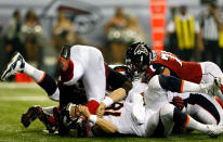 ATLANTA, GA - SEPTEMBER 17: Quarterback Peyton Manning #18 of the Denver Broncos is tackled by the Atlanta Falcons during a game at the Georgia Dome on September 17, 2012 in Atlanta, Georgia. (Photo by Kevin C. Cox/Getty Images)