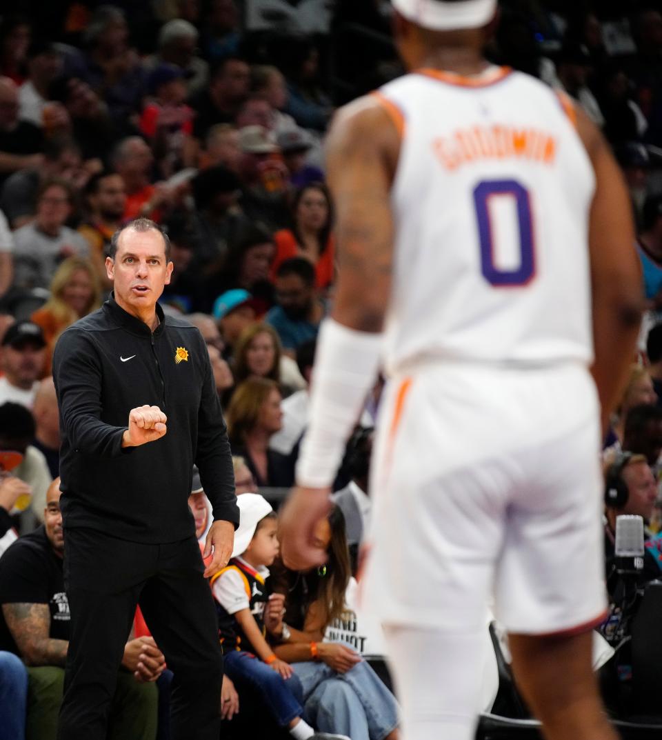October 28, 2023; Phoenix, Ariz.; USA; Suns head coach Frank Vogel talks with guard Jordan Goodwin during the first half of the home opener against the Jazz at the Footprint Center.