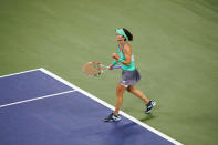 Alize Cornet, of France, reacts after winning a set against Emma Raducanu, of Britain, during the first round of the US Open tennis championships, Tuesday, Aug. 30, 2022, in New York. (AP Photo/Frank Franklin II)