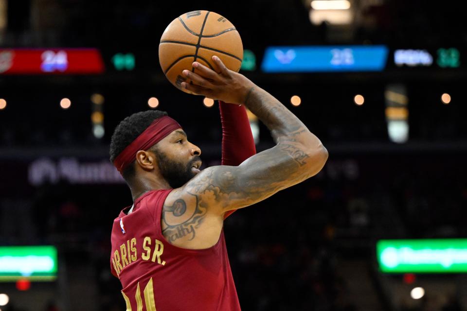 Cavaliers forward Marcus Morris Sr. shoots in the second quarter against the Charlotte Hornets, March 25, 2024, in Cleveland.