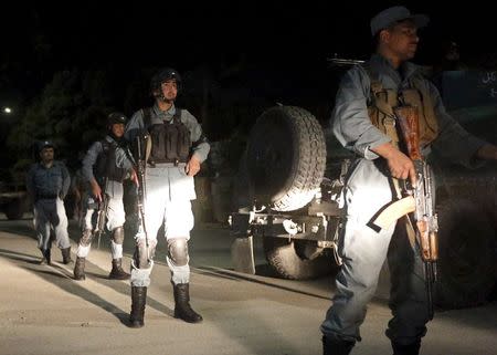 Afghan security forces arrive at the site of an attack in Kabul May 13, 2015. REUTERS/Omar Sobhani