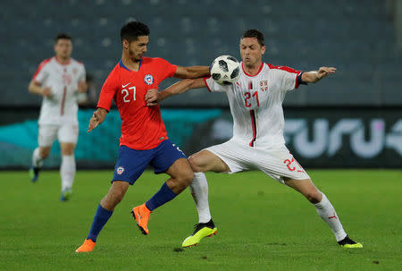 Soccer Football - International Friendly - Serbia vs Chile - Merkur-Arena, Graz, Austria - June 4, 2018 Chile’s Jimmy Martinez in action with Serbia’s Nemanja Matic REUTERS/Heinz-Peter Bader