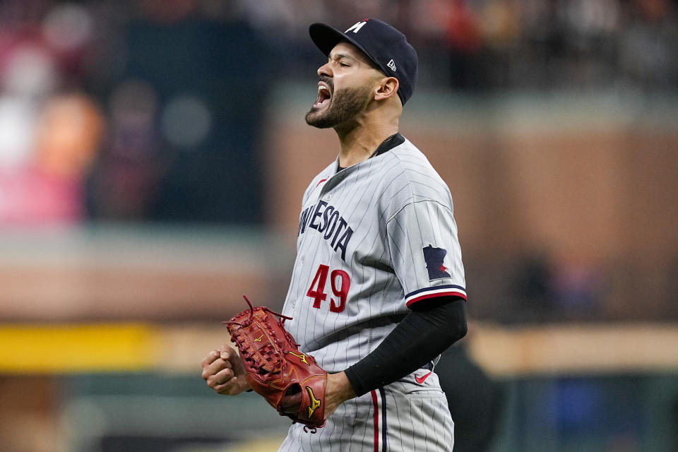 Minnesota Twins second baseman Edouard Julien celebrates the end of the seventh inning in Game 2 of an American League Division Series baseball game. against the Houston Astros in Houston, Sunday, Oct. 8, 2023. (AP Photo/Tony Gutierrez)