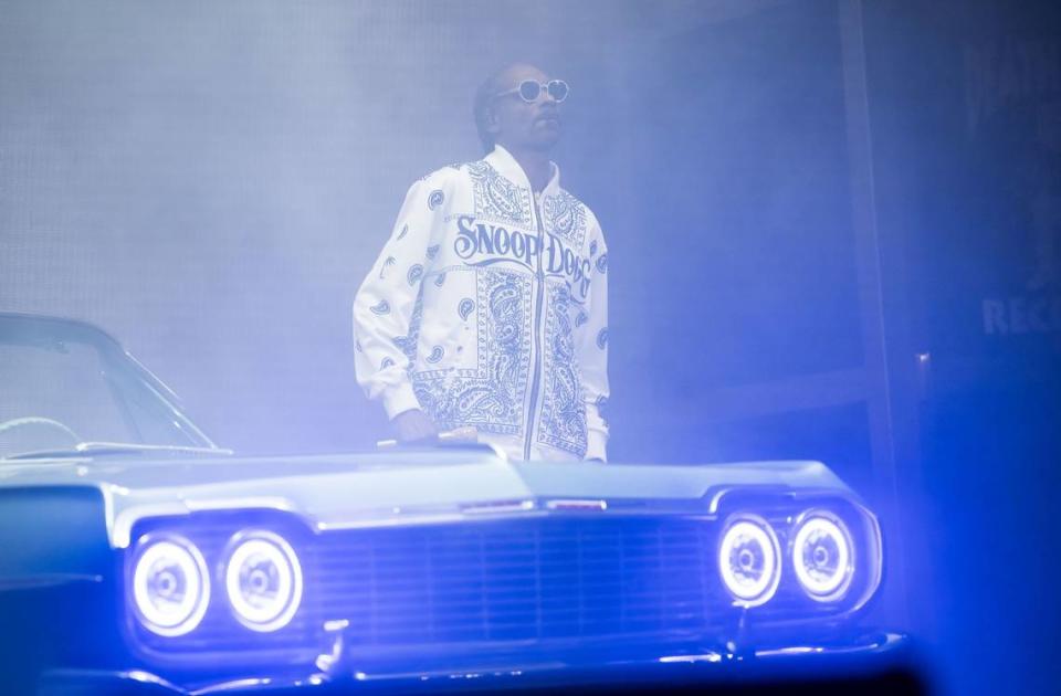 Rap icon Snoop Dogg takes the stage in a classic car to perform “The Next Episode” to open his set at his High School Reunion Tour stop in Sacramento on Friday, Aug. 25, 2023, at Golden 1 Center. Also performing were Wiz Khalifa, Too $hort, Warren G, Berner and DJ Drama.