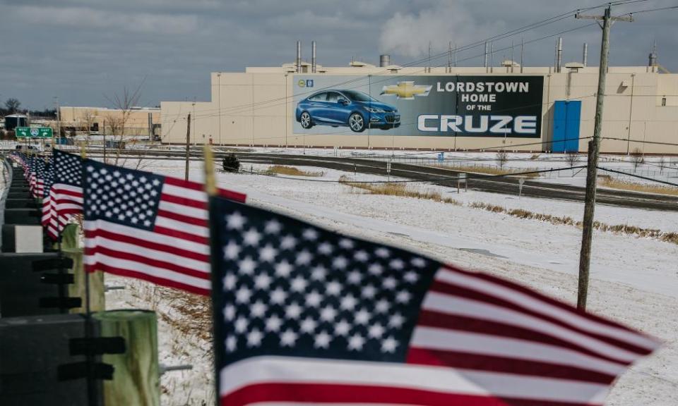 Flags fly in front of Lordstown’s GM production plant