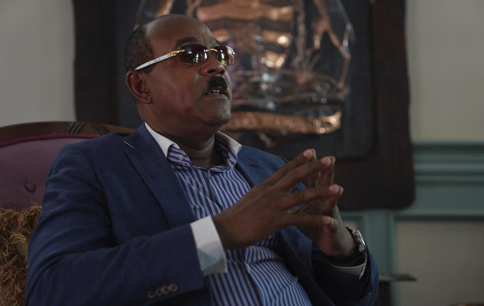 The Prime Minister of Antigua and Barbuda, Gaston Browne, speaks during an interview about his government’s policies granting the sacramental use of cannabis for the Rastafari community, on Friday, May 12, 2023, in St. John’s, Antigua. He says the values of Rastafari, "brotherly love, good health, even their diet, which is plant-based, is something that can help all of humanity." (AP Photo/Jessie Wardarski)