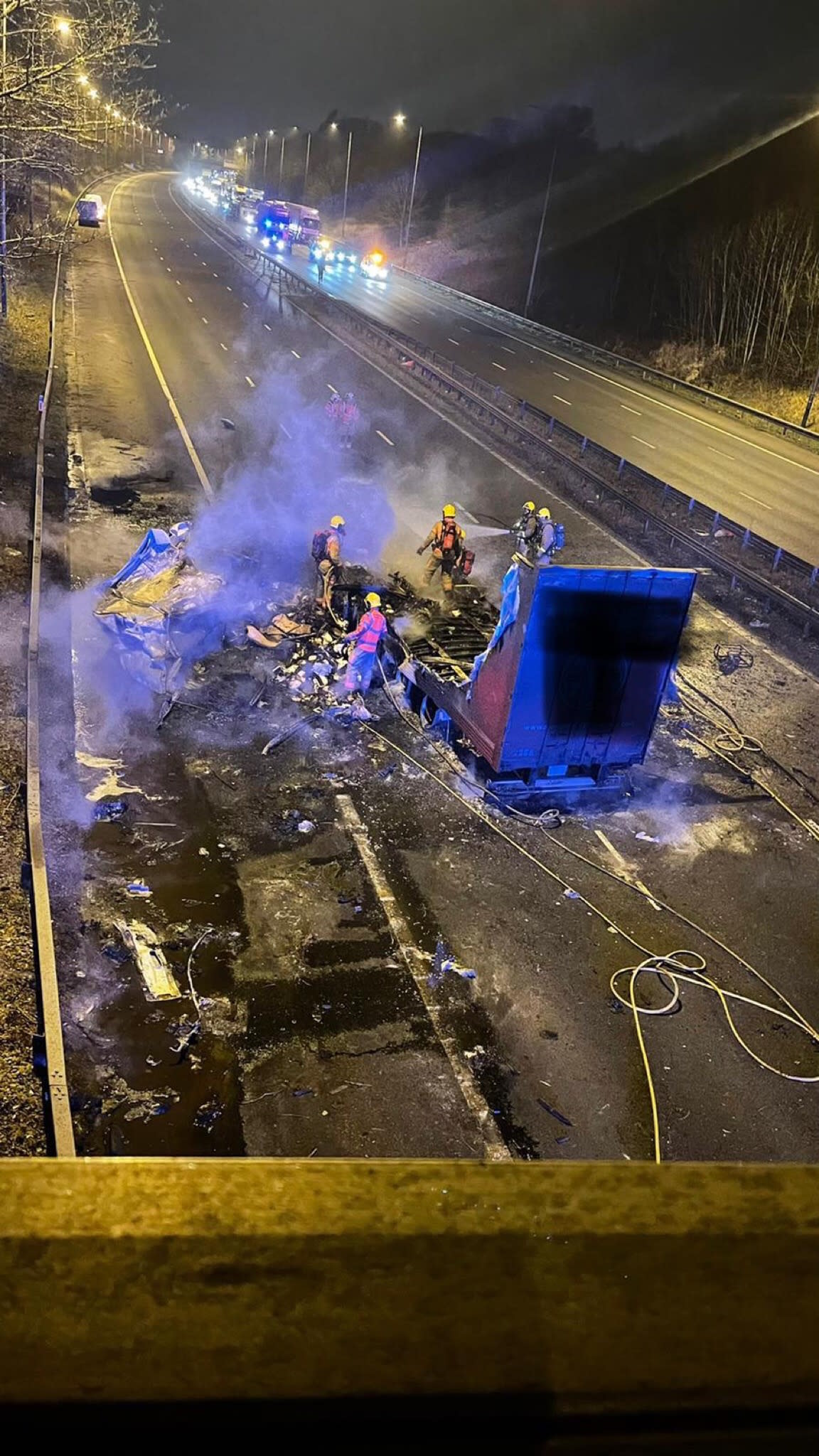 The lorry hit a bridge before catching fire. (Lancashire Police)