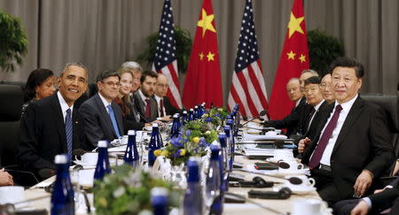 U.S. President Barack Obama (L) meets with Chinese President Xi Jinping (R) at the Nuclear Security Summit in Washington March 31, 2016. REUTERS/Kevin Lamarque